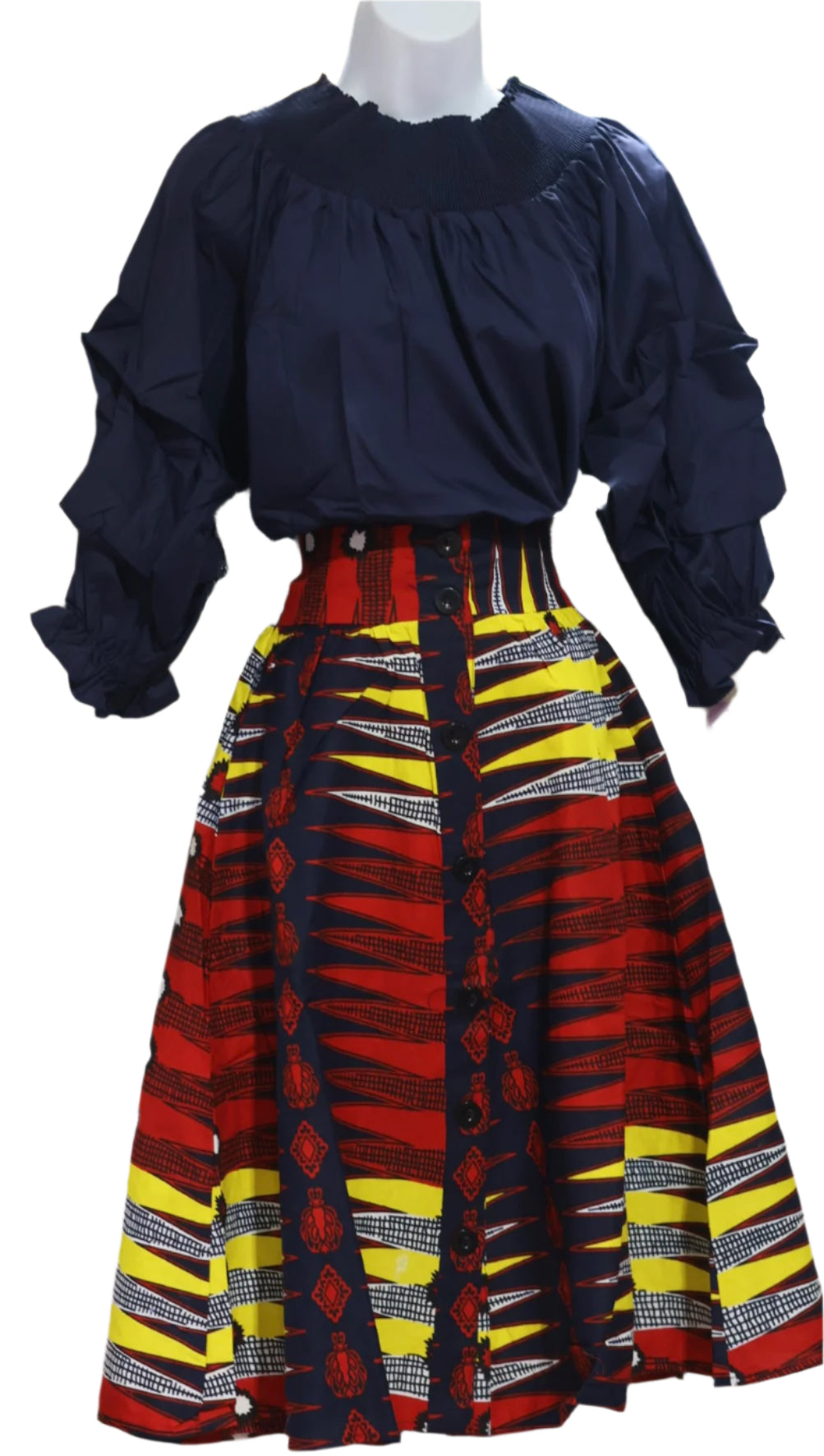 Navy blouse with a colorful patterned skirt on a mannequin against a white background