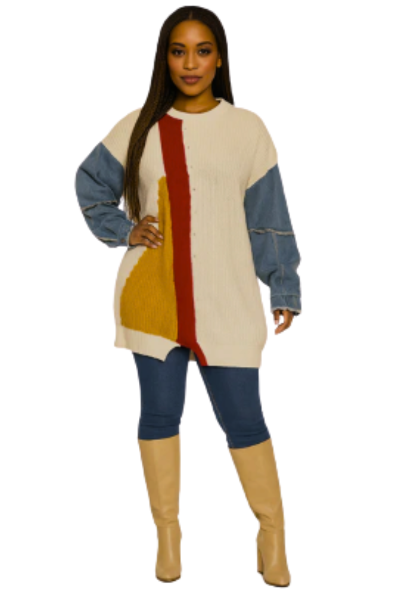 Woman wearing a colorful long-sleeve top with blue pants and tan boots on a white background